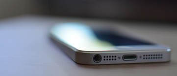 Mobile phone on table edge